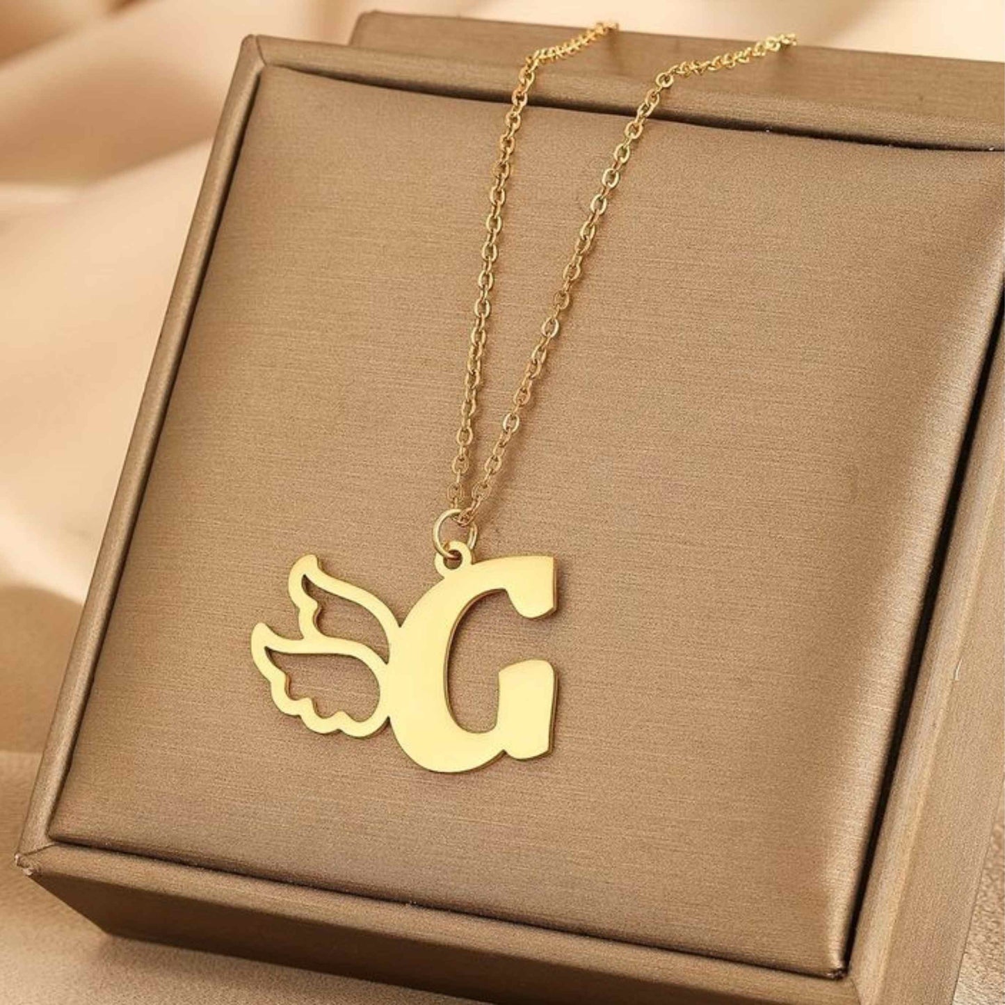 "Soaring Initial - Custom Winged Alphabet Necklace"
"Wings of Identity - Personalized Single Letter Necklace"
"